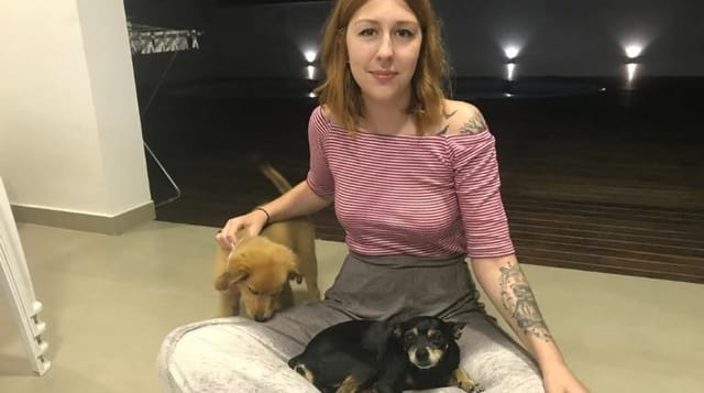 Lígia with two dogs