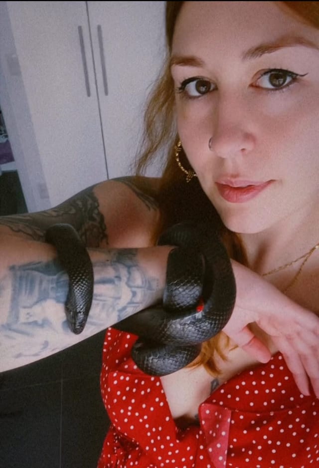 Lígia with a pet snake